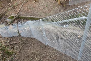 Absturzsicherung um Bachauslauf in Mellikon