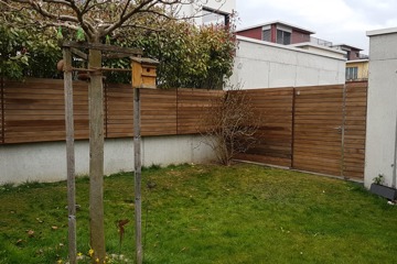 Holz-Sichtschutzzaun mit Türe in Erlinsbach